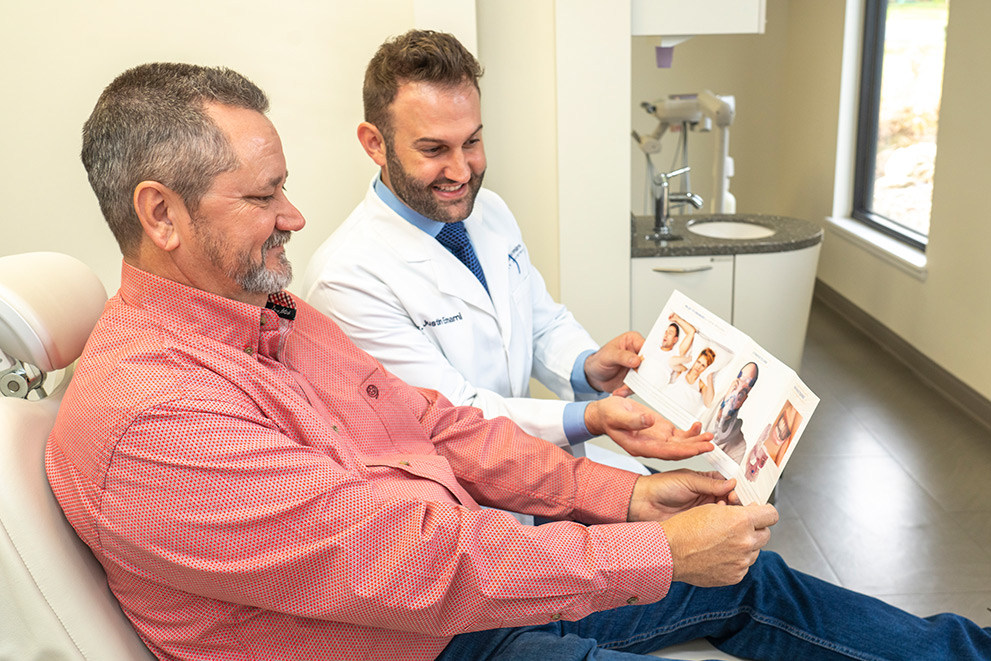 Discussing dental needs with a patient