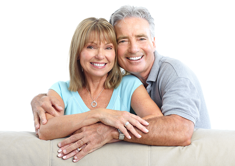 Senior Happy Couple With Dental Implants From Galleria of Smiles